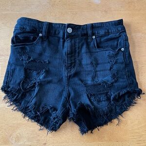Black boutique jean shorts with frayed hem